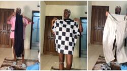 Fashionista shows off N50k worth of clothes gotten in Lagos market, peeps believe she was scammed