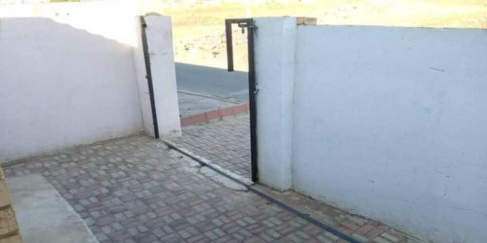 Social media reacts as lady says her house gate was stolen overnight