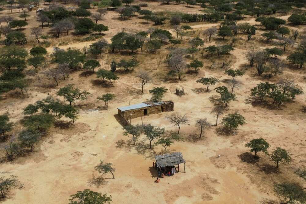 El Cerrejon is the largest open-pit coal mine in Latin America, stretching over 69,000 hectares across a harsh landscape that is also home to the semi-nomadic Wayuu tribe, who live in huts and survive off ranching, small-scale agriculture, and fishing