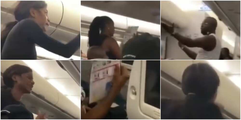 Passengers could be seen fanning themselves with papers Passengers could be seen fanning themselves with papers