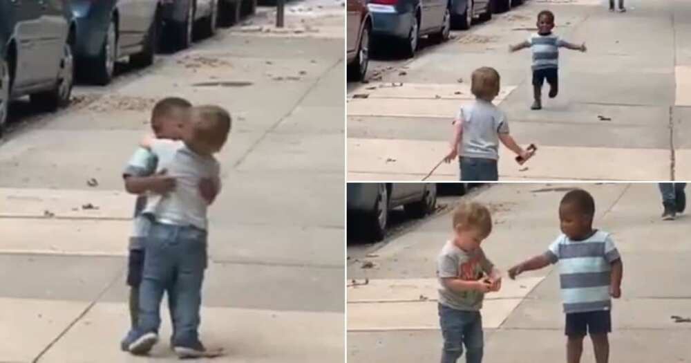 Dad posts adorable video of toddlers hugging on the street: "So sweet"