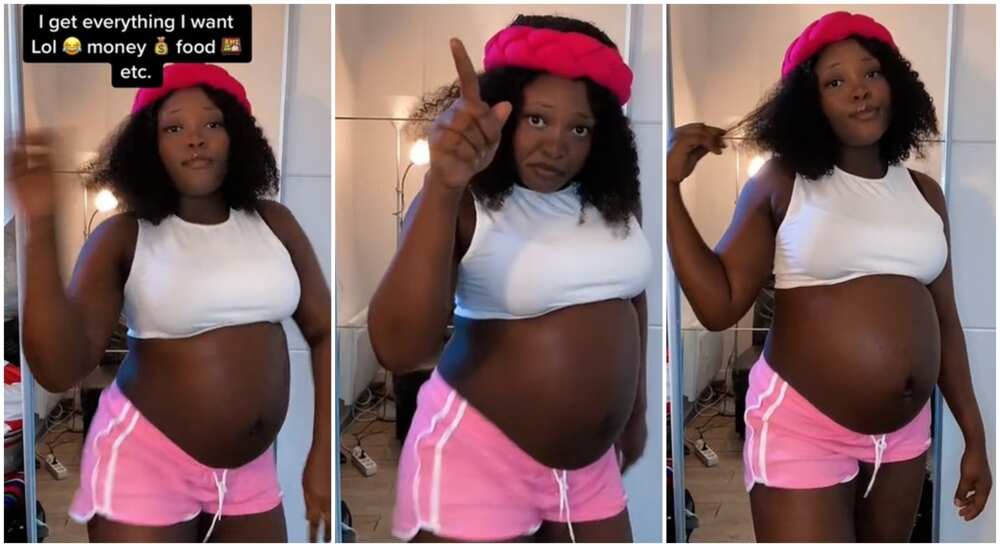 Photos of pretty black woman who is pregnant.
