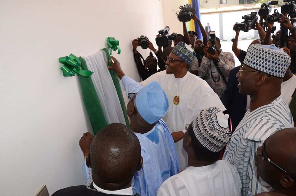 Buhari inaugurates police data centre, electronic surveillance vehicles