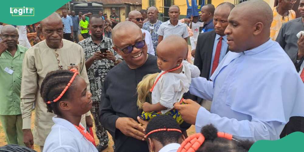 Peter Obi with Archbishop Valerian Okeke during a visit to Onitsha Correctional Centre