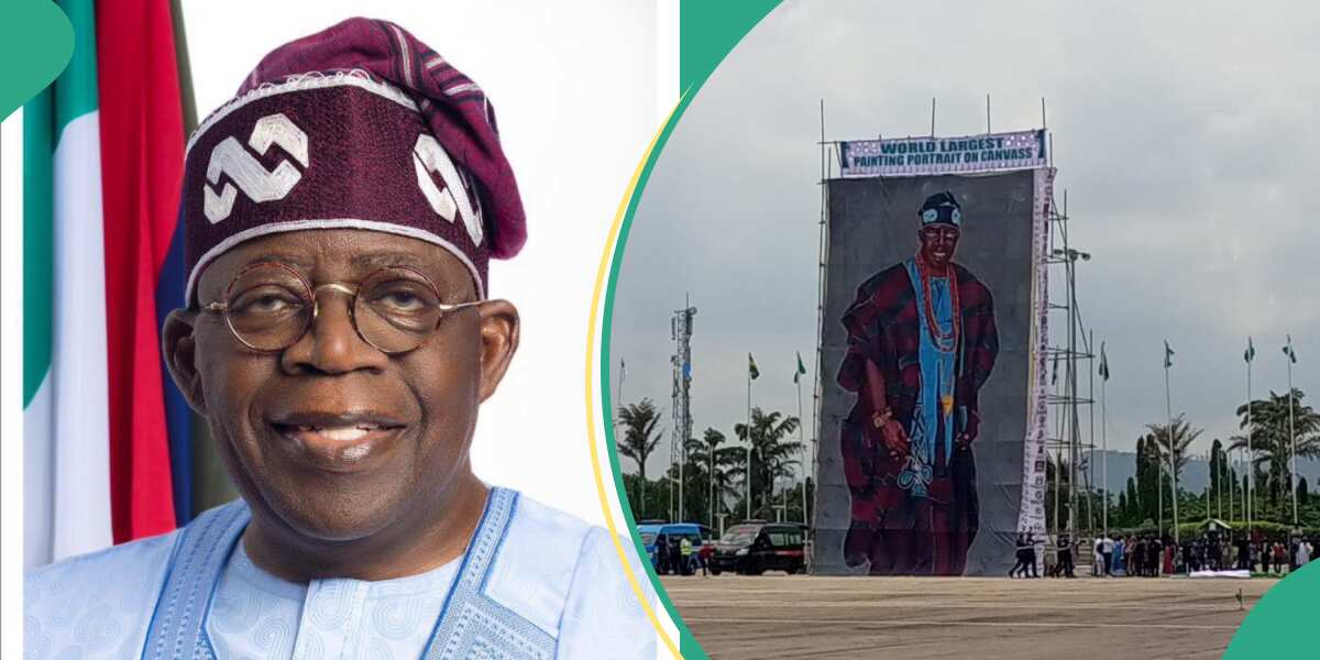 Breaking: Watch video as Tinubu receives Largest painting portrait on democracy day