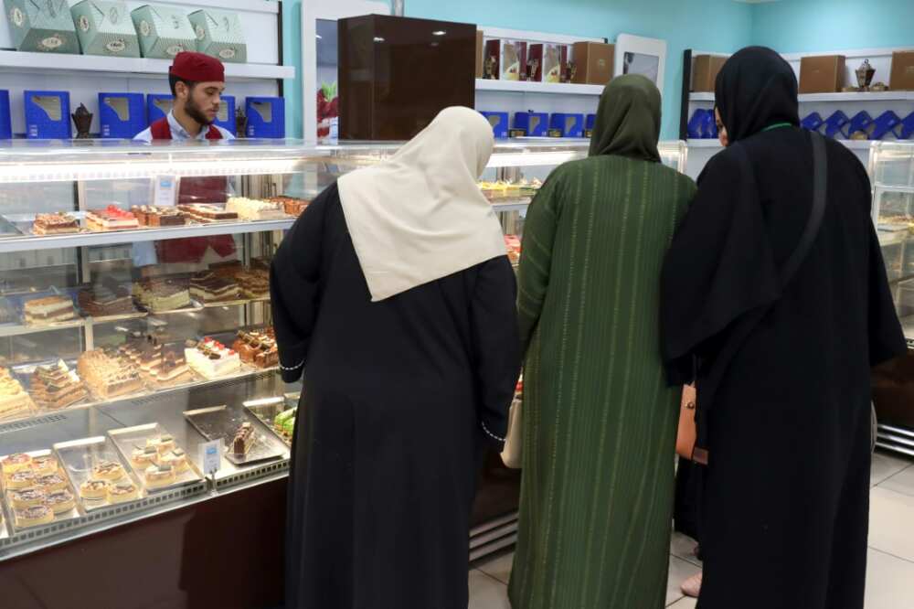 Libyans shop for confectionery at a store in Tripoli