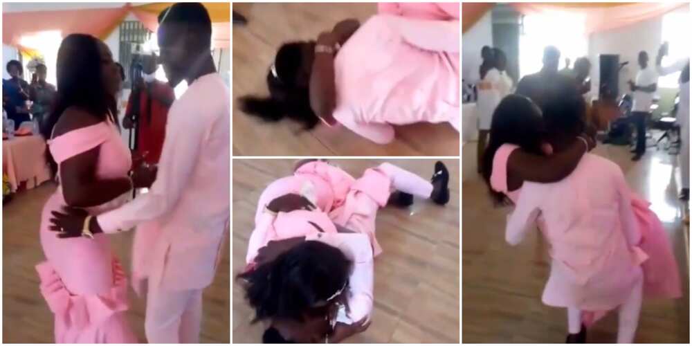 Lady gives man kiss after they fell awkwardly when he tried lifting her up in cute video