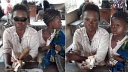 Female blind beggar miraculously regains eyesight after she was threatened with teargas (photos)