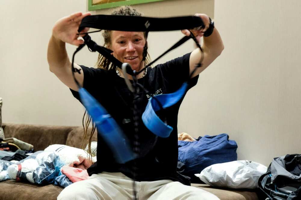Kristin Harila checks her gear in her hotel room in Nepal in the early stages of her record attempt