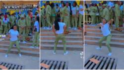 "Why is the guy staring?" Shy female corps member shows off smooth legwork in video, men focus on her