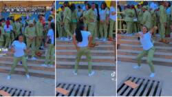"Why is the guy staring?" Shy female corps member shows off smooth legwork in video, men focus on her