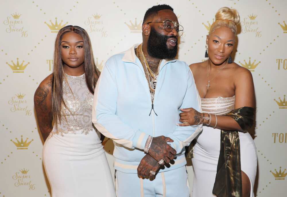 Brittany Roberts (L) Rick Ross (C), and Briana Camille (R) at Versace Mansion