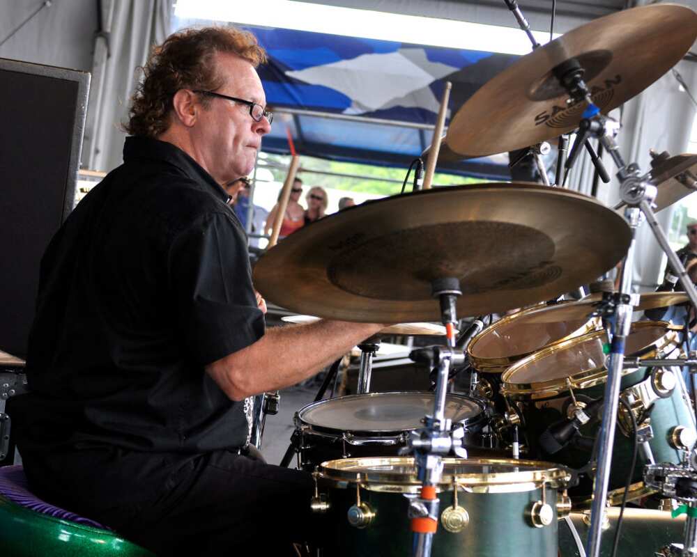 Tony Braunagel playing drums at a concert