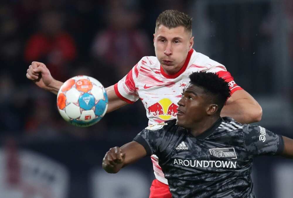 Nottingham Forest have signed Union Berlin's Nigerian forward Taiwo Awoniyi (R)