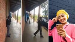 Shy schoolboy in uniform sings with a beautiful melody on assembly ground, wows students in video