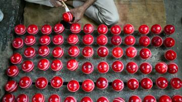 Sacred cow: Ball makers break taboos for India's favourite sport