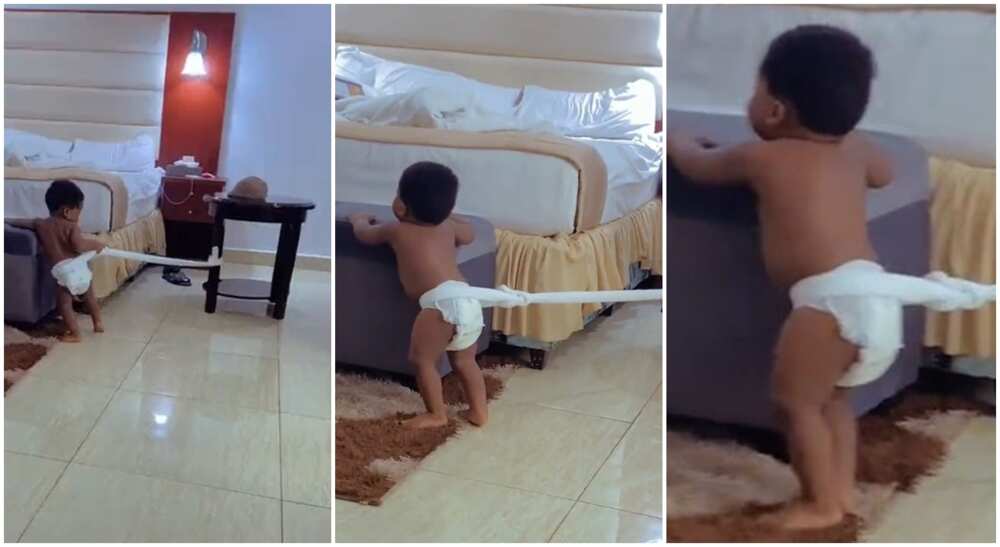 Photos of a Nigerian baby restrained with a rope by his father.