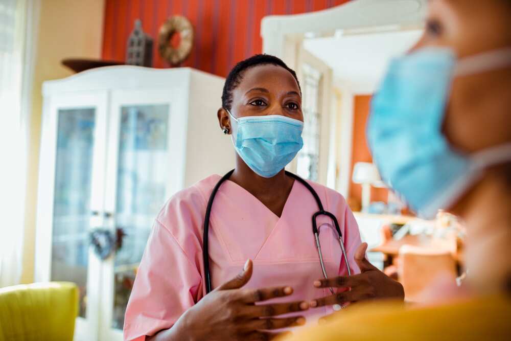 Close up of a senior woman talking to her caregiver