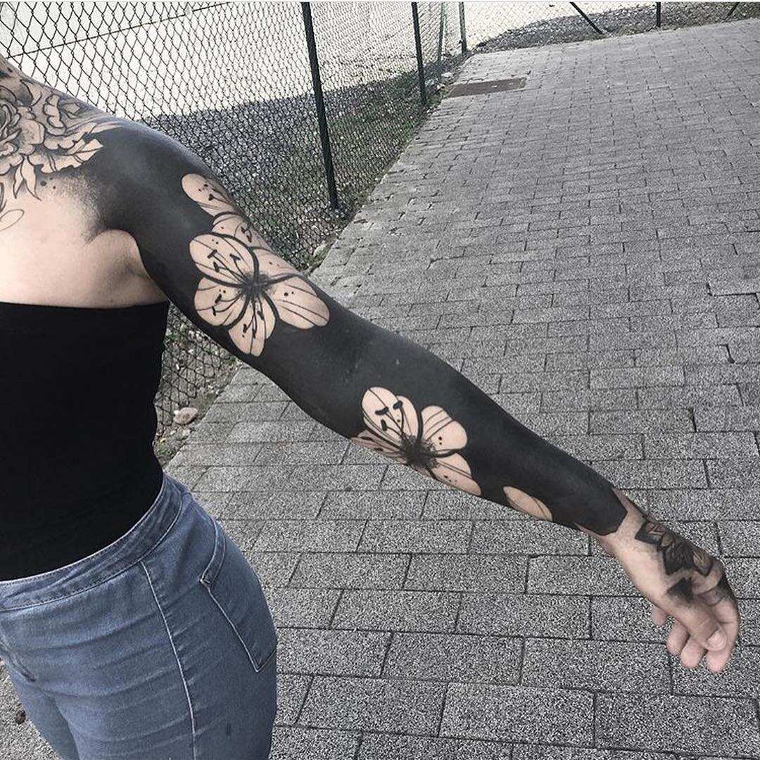 25 blackout tattoo design ideas for men and women Legit.ng