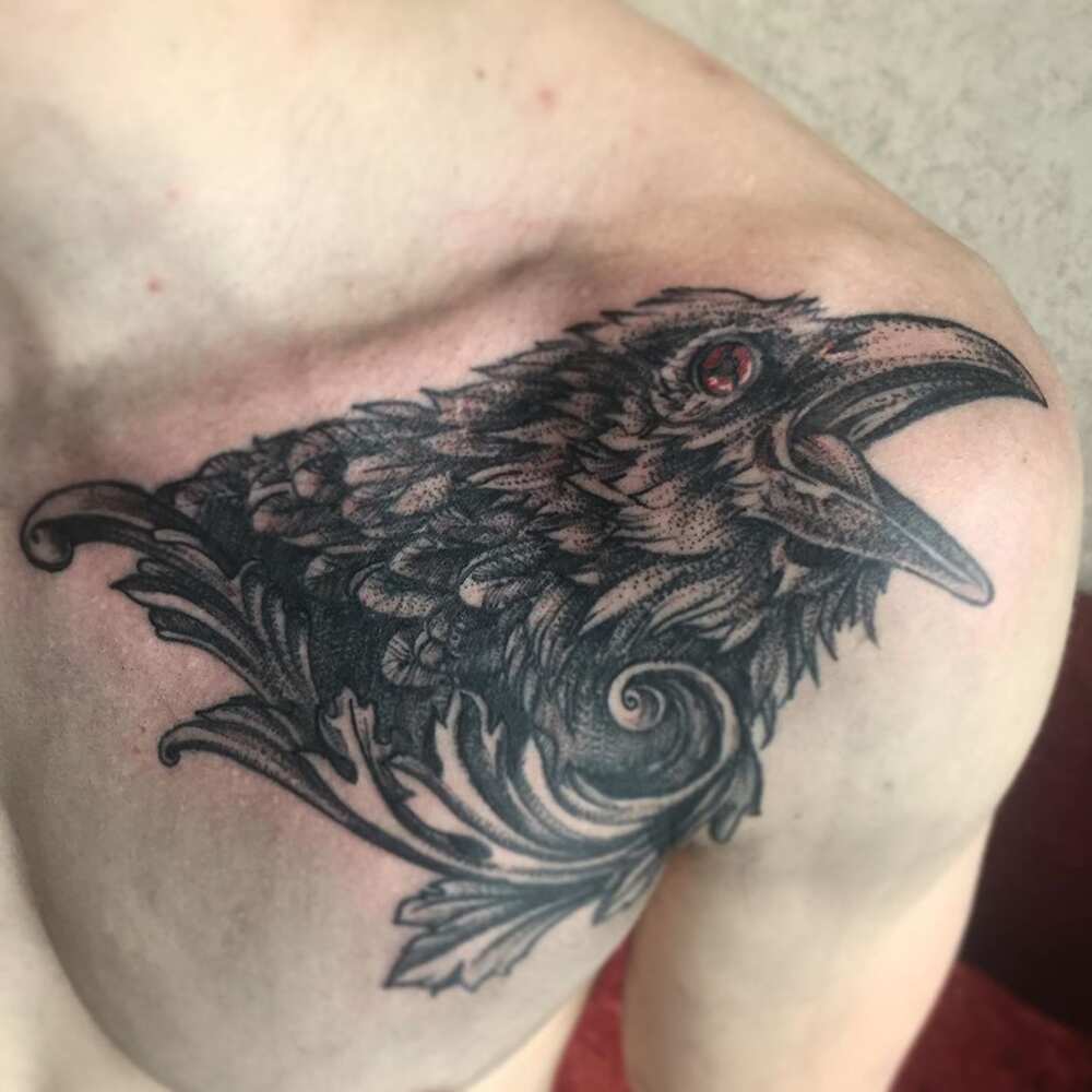 raven feather tattoo