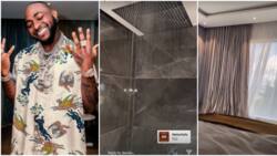 E dey quick spoil: Nigerians react as Davido shows off automated curtain and shower in Banana Island mansion