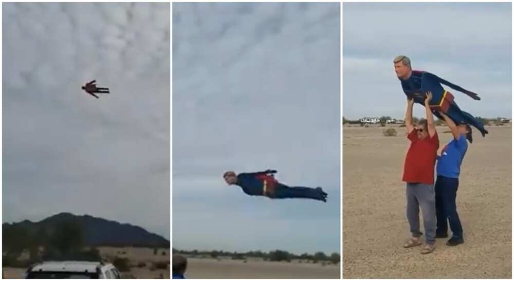 Photos of superman drone flying over the sky.