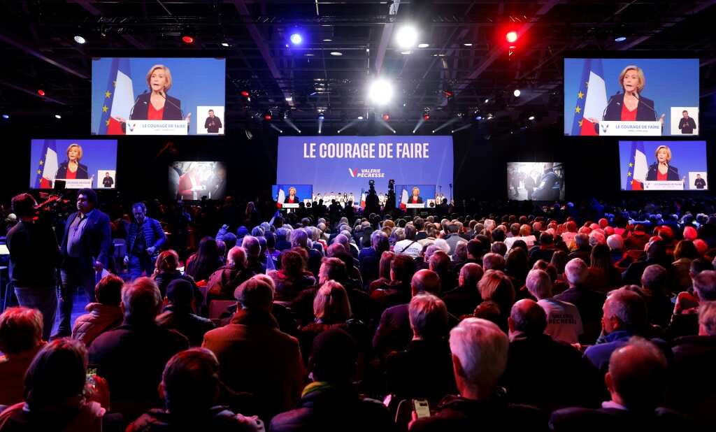 Sarkozy's name jeered at French election rally