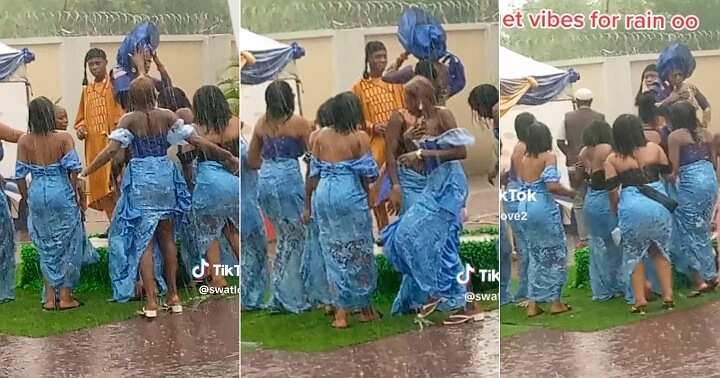 Asoebi ladies dance under rain