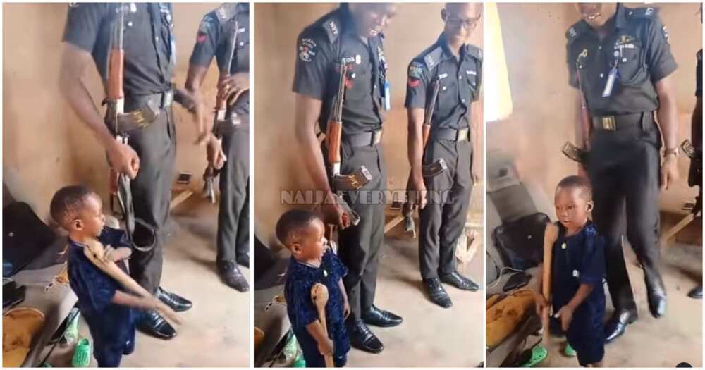 Bold little boy, policemen, guns, Nigerian policemen with guns