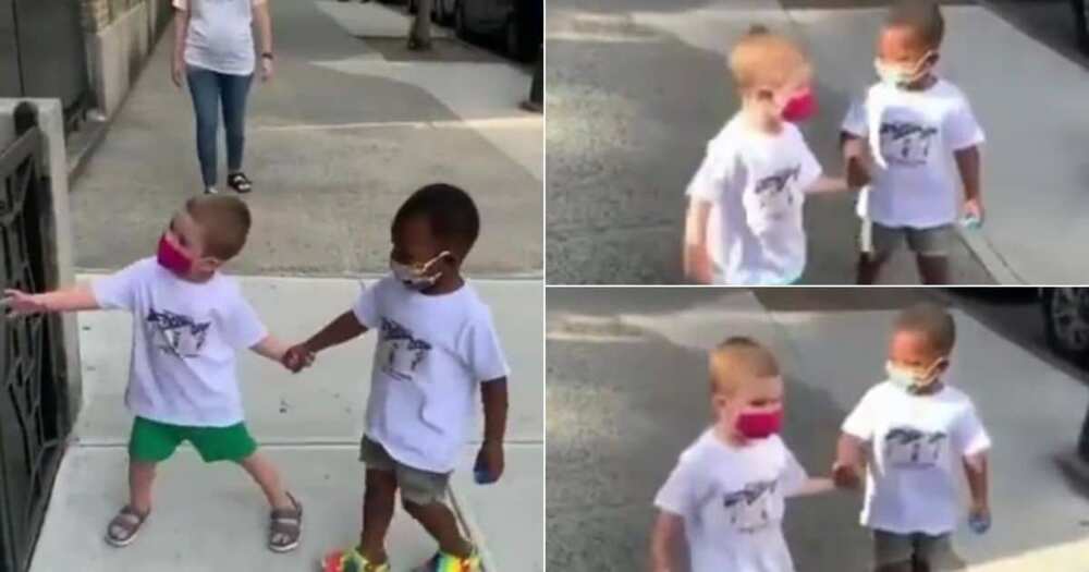 Video of besties holding hands while wearing masks goes viral Video of besties holding hands while wearing masks goes viral