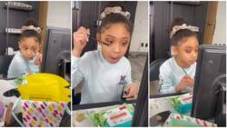 Where did she learn this? 7-year-old girl seen making up like a pro in stunning video, many react with frenzy