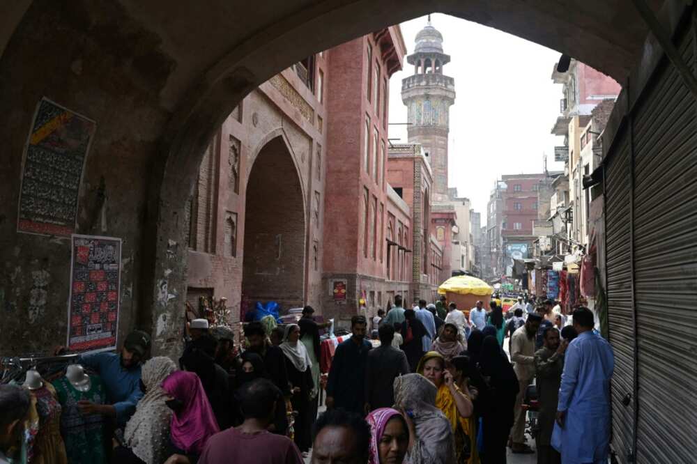 Instead of buying off-the-rack clothes for the girls, Fatima went shopping for fabric in the Old Lahore district and plans to home-stitch their holiday outfits Instead of buying off-the-rack clothes for the girls, Fatima went shopping for fabric in the Old Lahore district and plans to home-stitch their holiday outfits