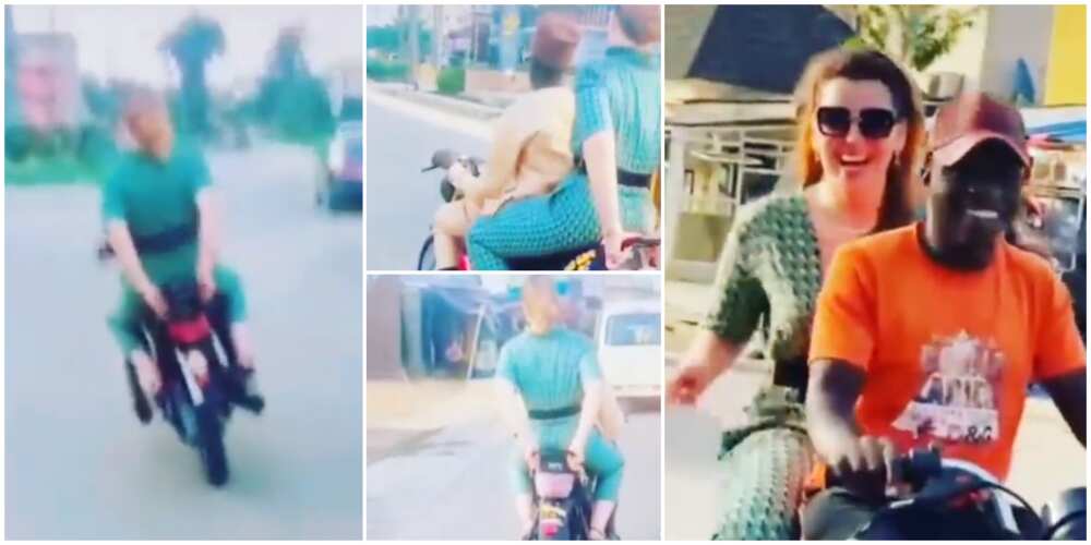 Nigerians react to new video of Oyinbo lady riding okada in Lagos