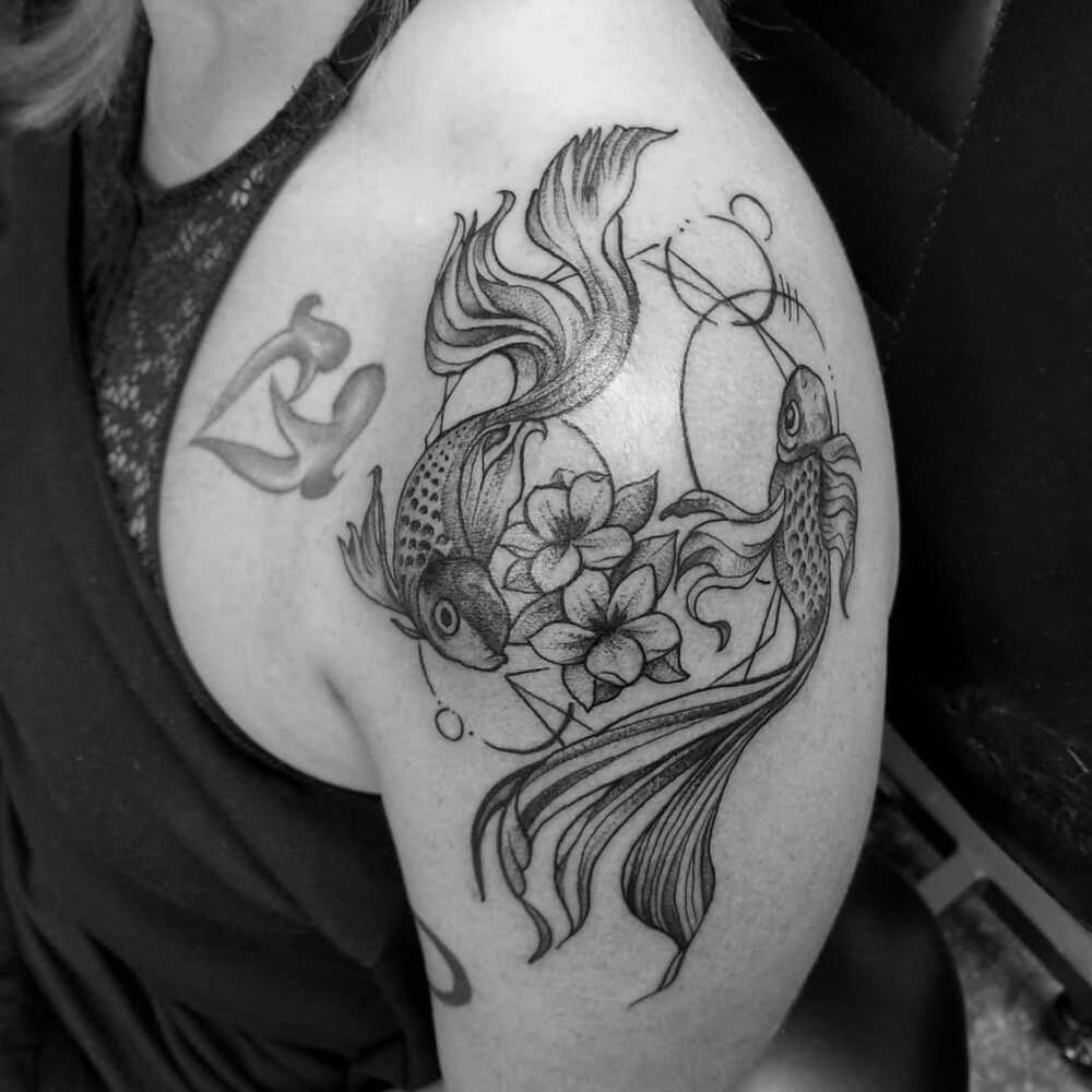 Pisces sign tattoo
