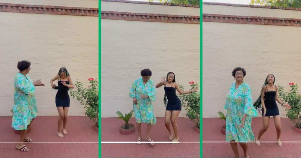An aged grandmother and her granddaughter dancing and vibing to a music