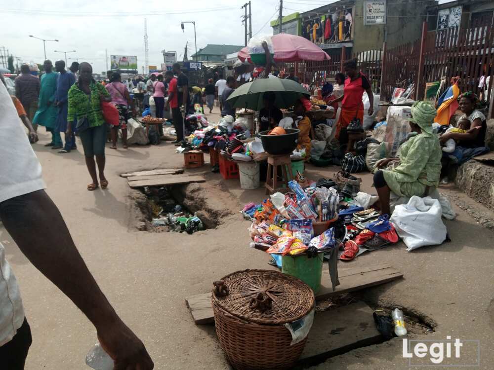 While some traders are making sales, others are sitting idle in popular Lagos market. Photo credit: Esther Odili