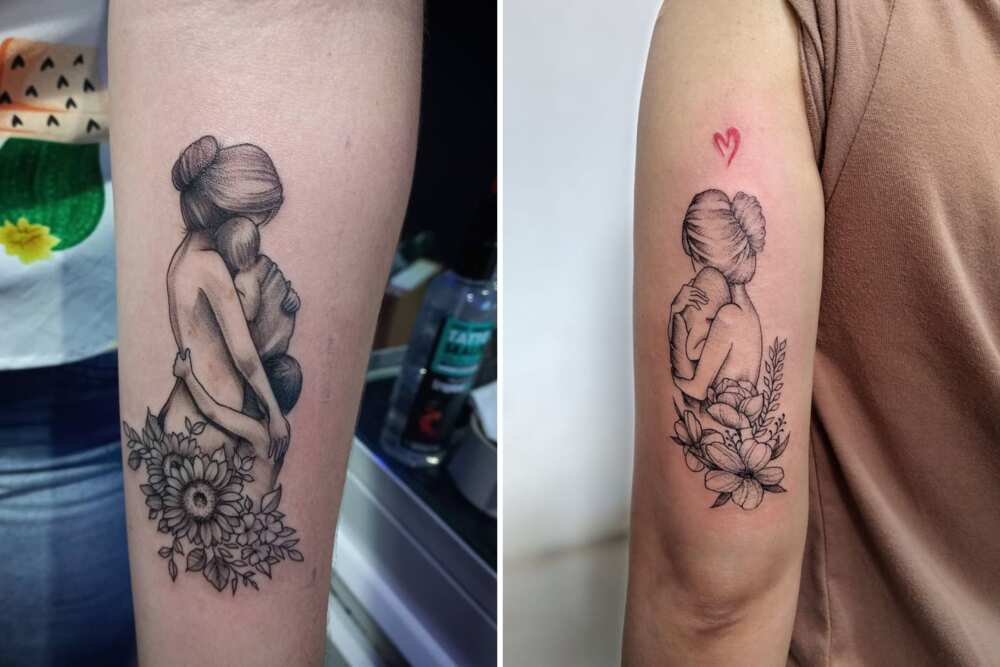 mother holding child tattoo