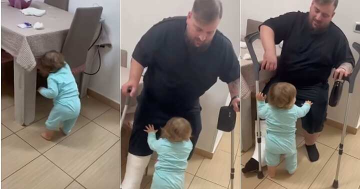 Little girl helps injured father, sit on chair