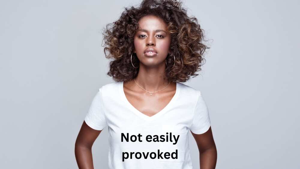 An African woman displays white lie shirt ideas