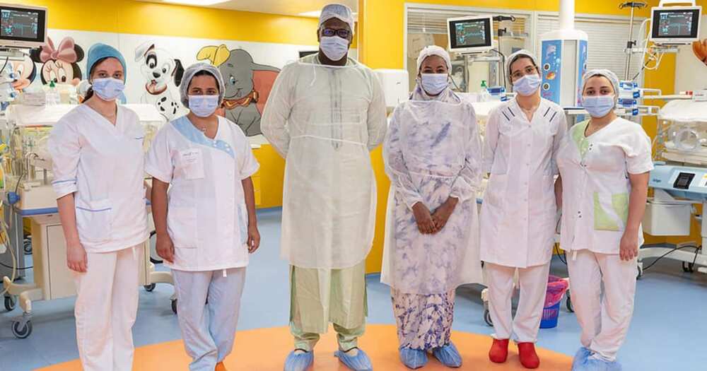 Halima Ciss, her husband and a team of nurses.