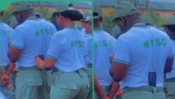 "A perfect gentleman": NYSC lady hangs her phone on waist of male corps member, records herself