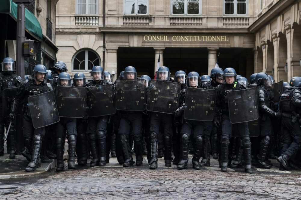Dozens of riot police protected the Constitutional Council during demonstrations on Thursday