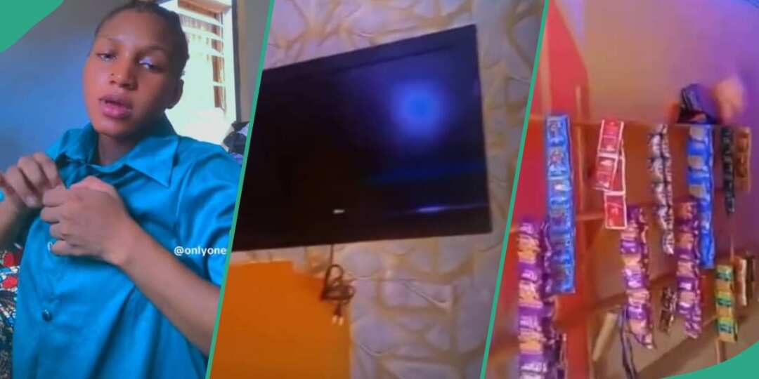 Watch video as lady with few goods in her shop displays the costly plasma TV she mounted inside