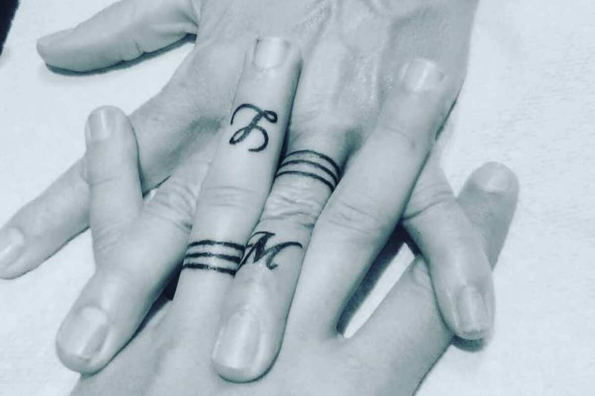 Machine Gun Kelly and Megan Fox debut matching finger tattoos