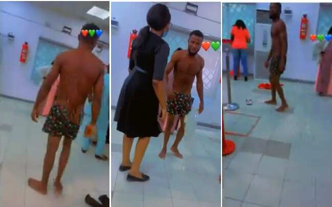 Man strips to his boxers inside a Nigerian commercial bank in protest for being wrongfully debited