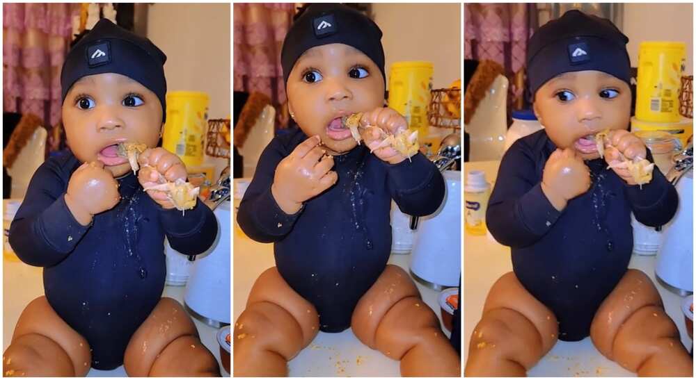 Photos of a baby eating chicken bone.