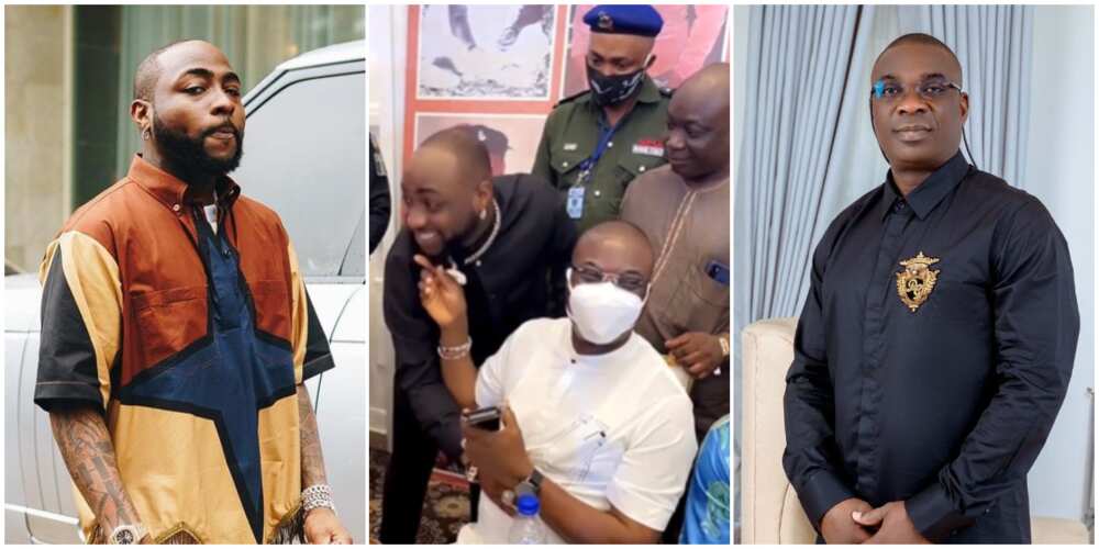 Reactions trail KWAM1 for pulling Davido's beards after singer greeted him at party