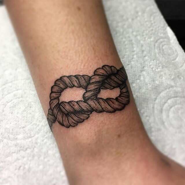 Small Rope Knot Tattoo On Wrist