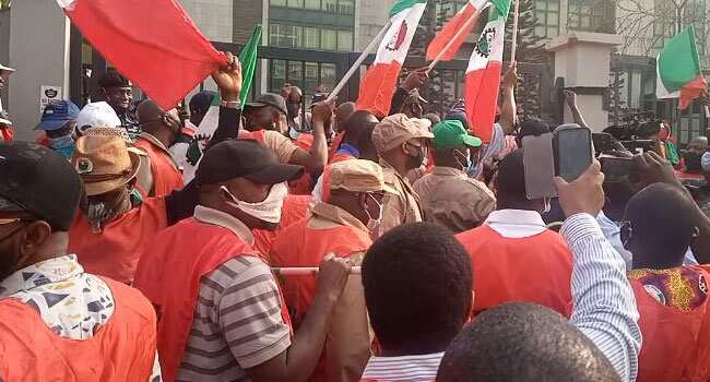 Video, photo reveal NLC, TUC members thrown into chaos as they protest in Abuja