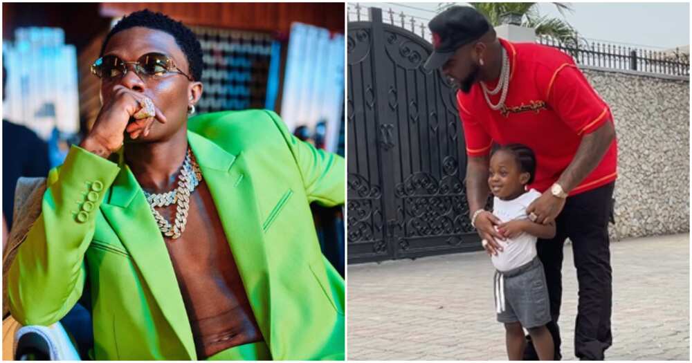 Wizkid on green jacket, Davido holds his late son Ifeanyi